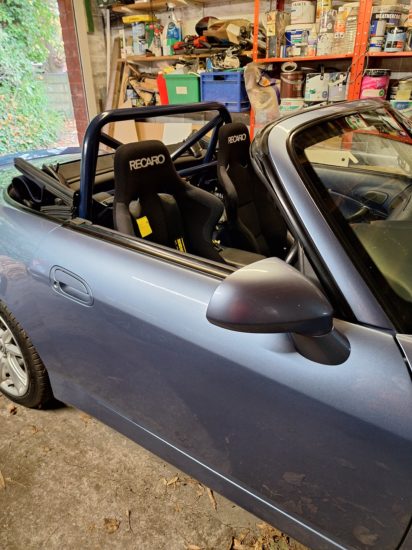 Recaro Profi SPG seat installed in a Honda S2000 using PCI mounts, showcasing precise fit with Schroth harnesses